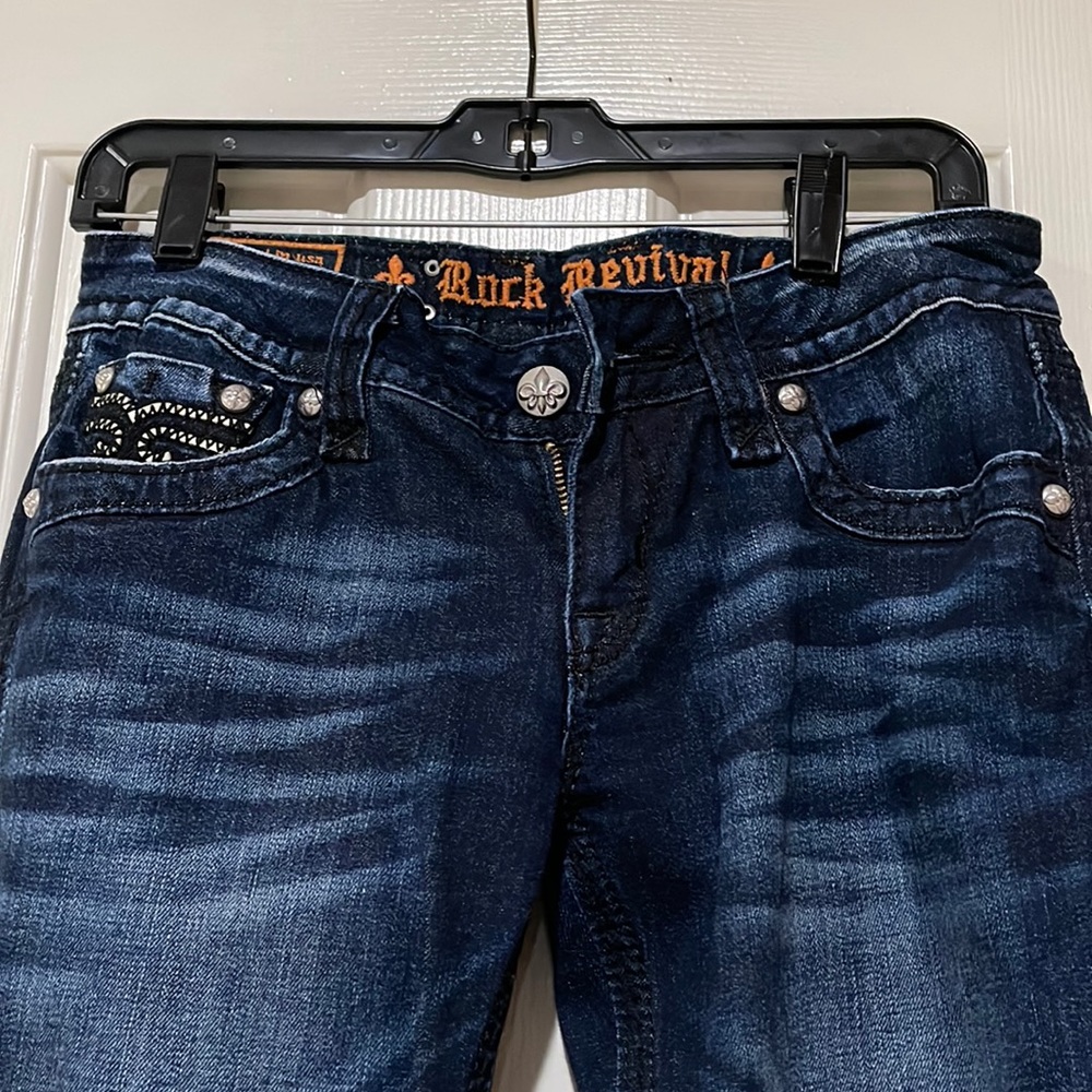 Women’s Rock Revival dark wash straight leg jeans.  Size 28.